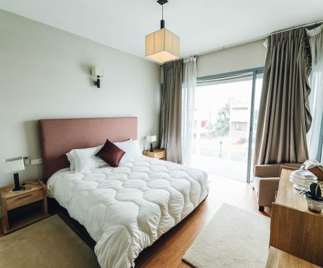 White Bed Near Window