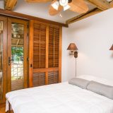 Closed Wardrobe Near on Bed