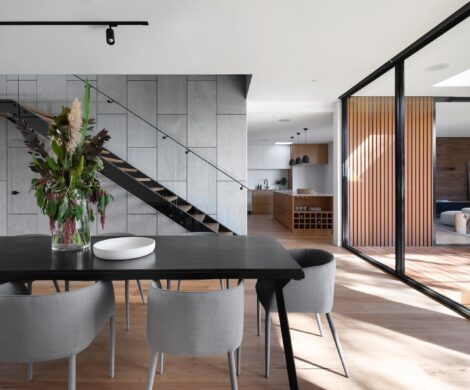 black wooden table and chairs