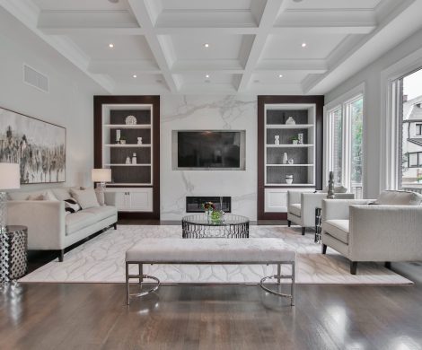 white wooden coffee table near white sofa
